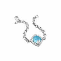 silver bracelet with blue stone