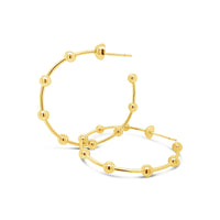 large 18k gold wire hoop earring with gold balls
