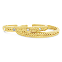 Herringbone bracelet cuffs with princess cut diamonds in 18k yellow gold