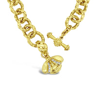 gold bumble bee pendant with diamonds