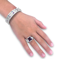 square cut blue topaz cuff bracelet with herringbone pattern in sterling silver