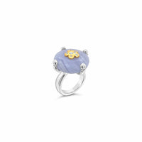 Ring with an agate stone and gold accents on a white background