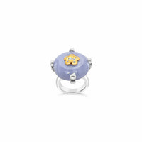 Ring with an agate gemstone and gold flower on a white background