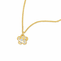 Gold necklace with a flower-shaped pendant on a white background