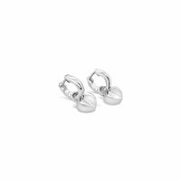 Pair of silver hoop earrings on a white background