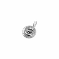Silver pendant with a religious design on a white background