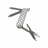 Multitool with various tools on a white background
