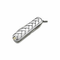 Silver pocket knife with a decorative pattern on a white background