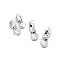 Silver heart-shaped hoop earrings on a white background