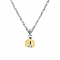 small gold ladybug pendant on chain