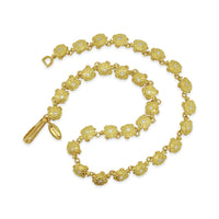 gold necklace with turtle