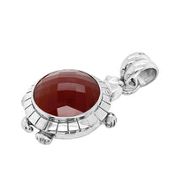 large silver turtle pendant with carnelian
