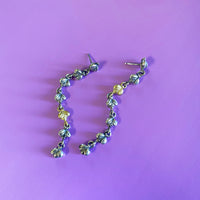 silver and gold chain earrings with bees