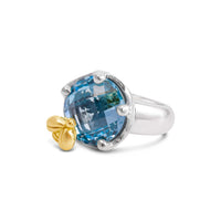round faceted blue topaz ring