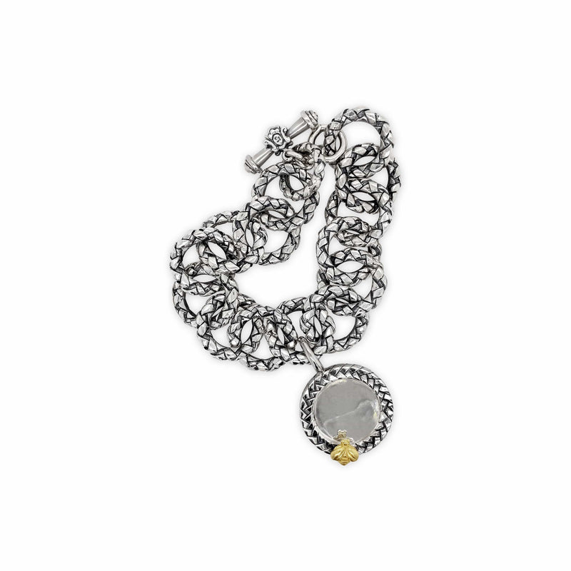 products/silver_bracelet_with_engraved_charm.jpg