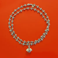 silver necklace with diamond bumble bee pendant