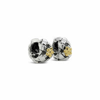 silver huggie earring with gold blossom