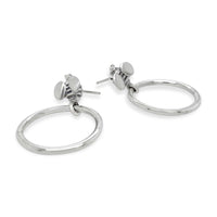 small silver hoop earrings with bees