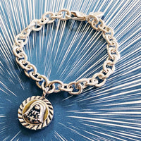 st._rita_silver_charm_bracelet