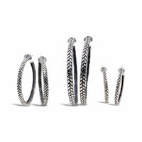 sterling silver trenza hoop earrings