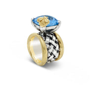wide band ring with blue topaz